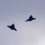 Two French Dassault Rafale fighter jets fly after a signing ceremony between French President Emmanuel Macron and Croatia’s Prime Minister Andrej Plenkovic in Zagreb, Croatia