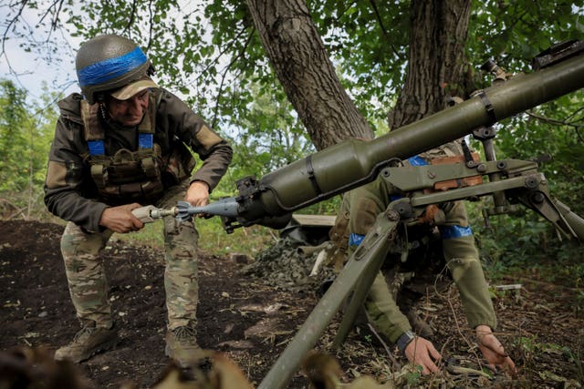 801570338fc54e11b3730692889ec4bb A Ukrainian serviceman of the 24th Mechanised Brigade fires an Easel Antitank Grenade Launcher SPG9 towards Russian position at Chasiv Yar, Donetsk