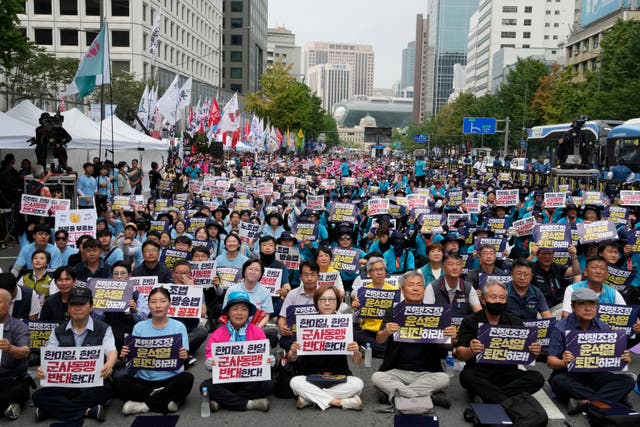 88969b3be21e4db8a4afe0057e1f9973 South Korean protesters stage a rally opposing the joint military exercises